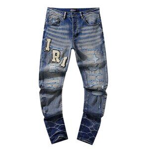 AMIRI Blue Distressed Jeans with Patchwork